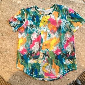 Lululemon size 6 multi colored tshirt- new without tags. Worn and washed once.
